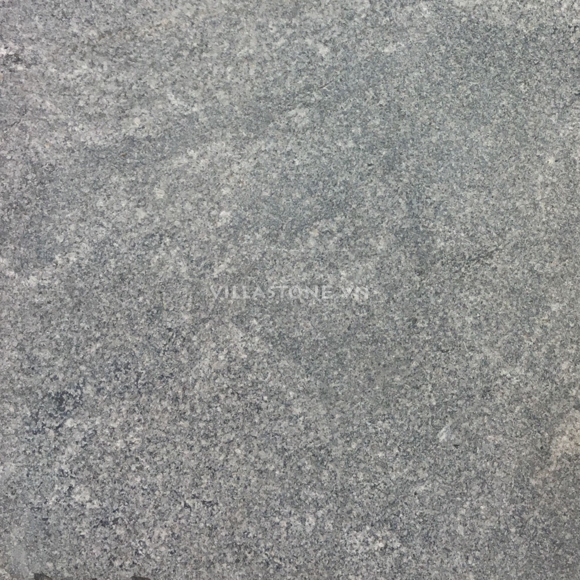 Dark crystallized bluestone veins cut sanded